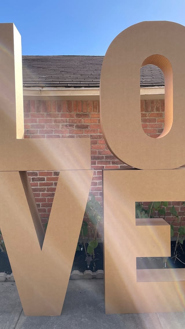 LOVE in big brown letters